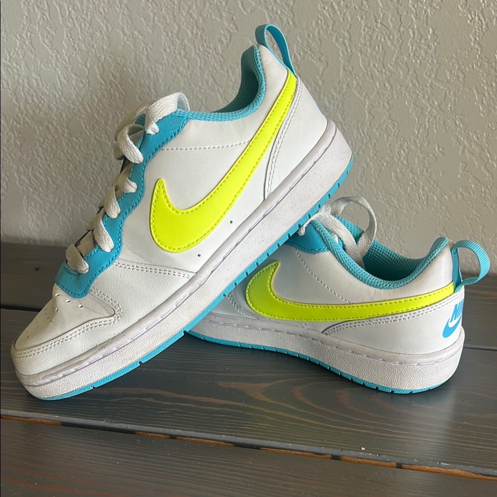 Nike White and Blue Sneakers with Classic Design
